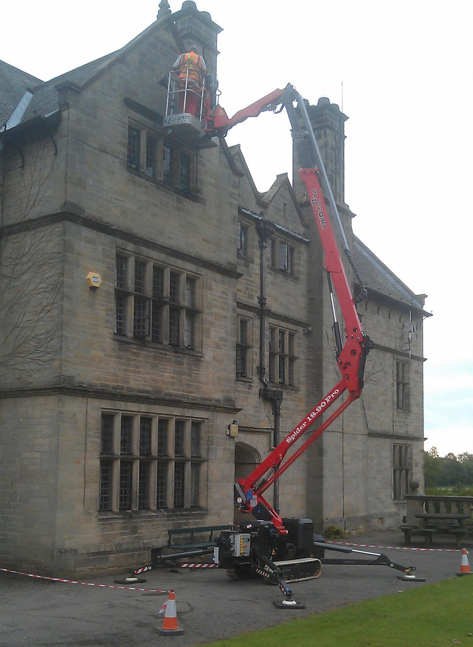 Sophie tracked spiderlift cherrypicker from High Reaching Solutions for maintenance on historic building near Kirkbymoorside Yorkshire