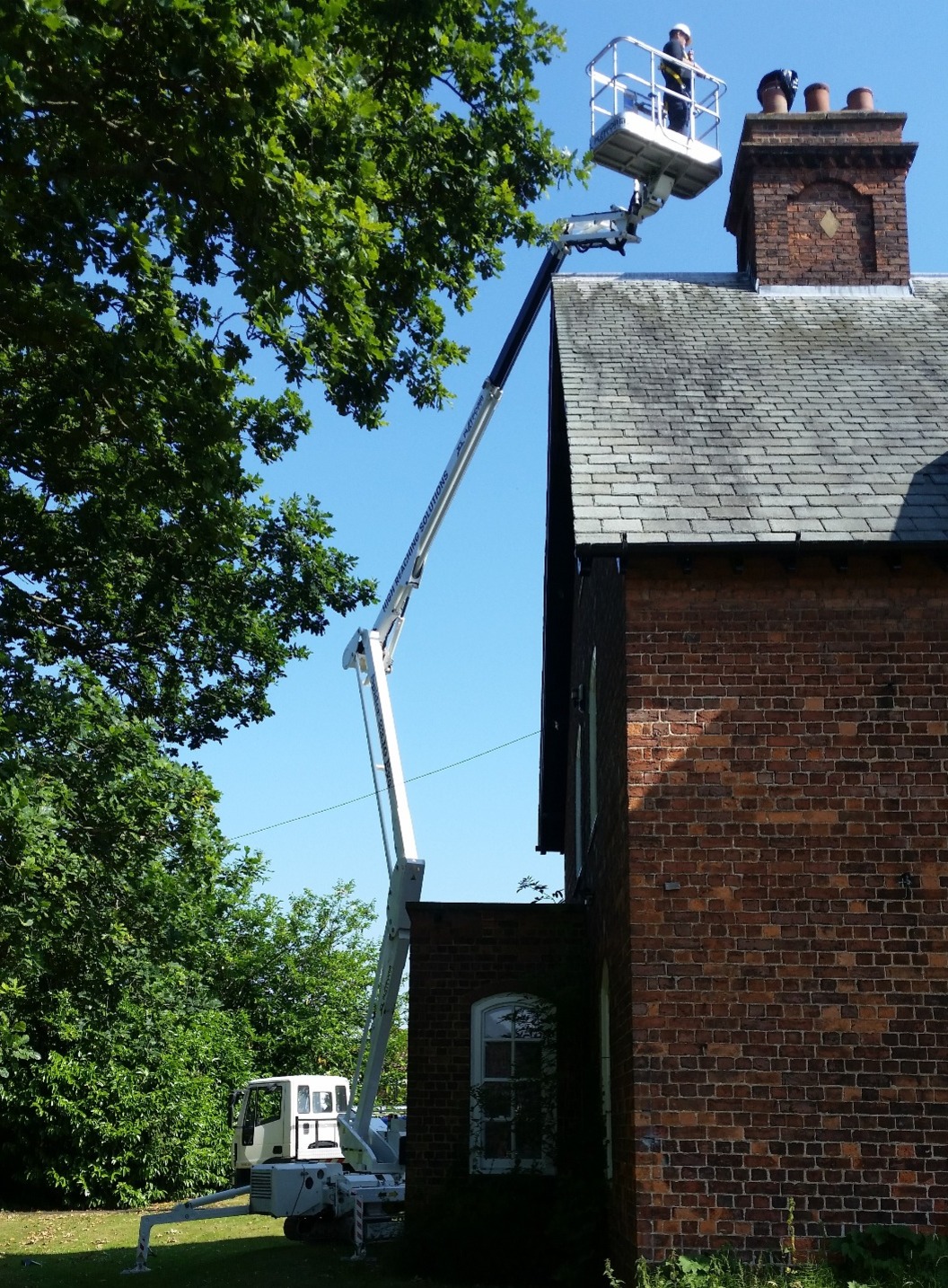 Tracked spider cherrypicker chimney maintenance