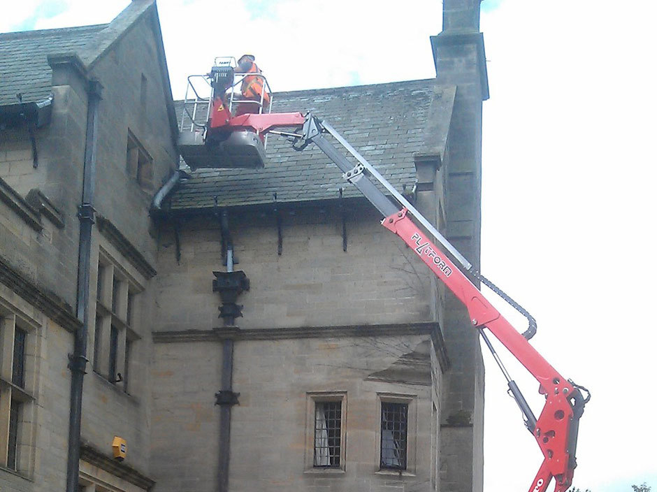 Sophie tracked spiderlift cherrypicker from High Reaching Solutions for roof maintenance on historic building near Kirkbymoorside Yorkshire